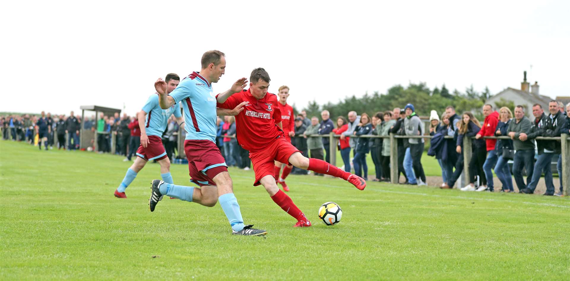 Groats' Ryan Campbell takes on Shaun Forbes in front of a big crowd at Ham Park. Picture: James Gunn
