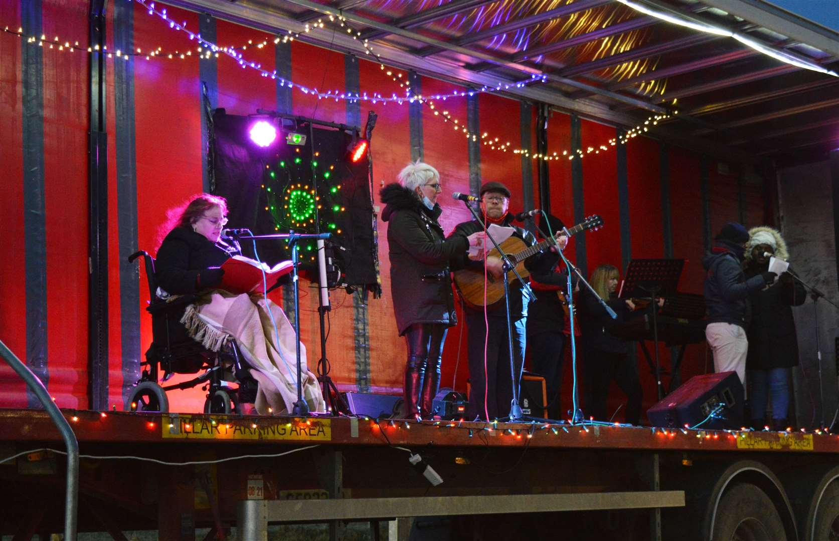 Festive music and song on the back of a trailer during one of the successful drive-in carol sessions in Wick on Sunday. Picture: Susan Barrie