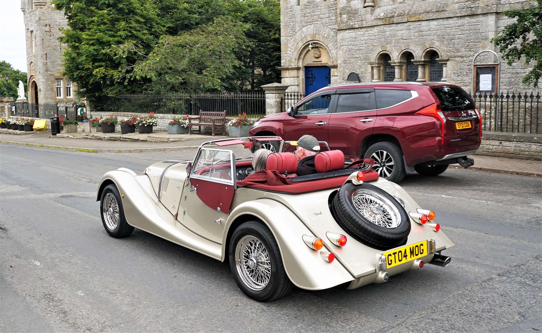 Ian and Elaine Grant drive away in their 2020 Morgan Plus 4 with bespoke trimmings. Picture: DGS