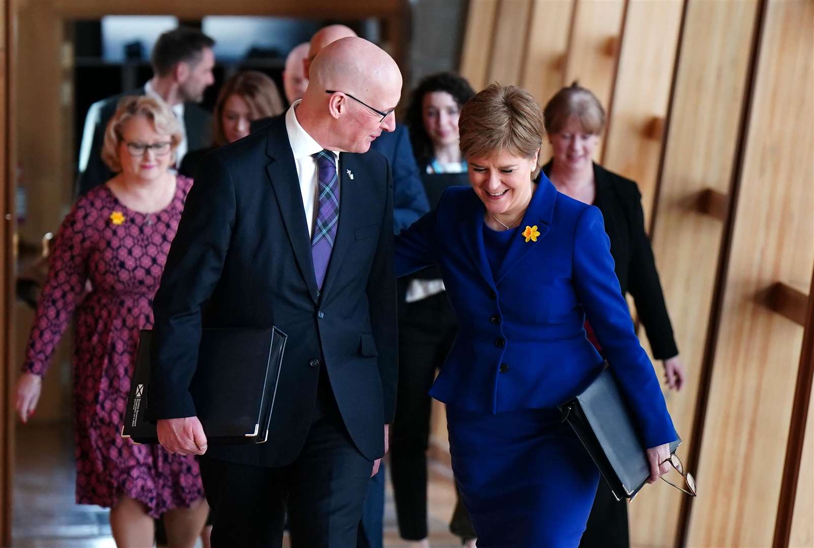 Ms Sturgeon was accompanied by Deputy First Minister John Swinney, who is also stepping down next week, as she arrived for First Minister’s Questions (Jane Barlow/PA)