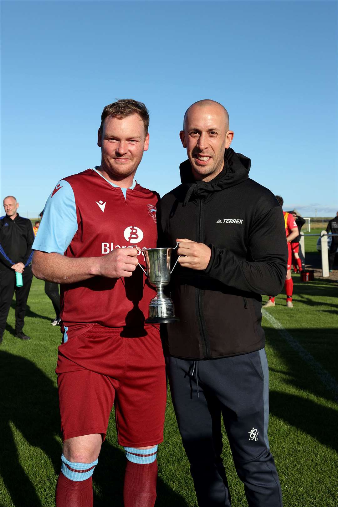 Gary Coghill of Caithness AFA presents the county league player of the year award to Pentland United striker James Murray. Picture: James Gunn