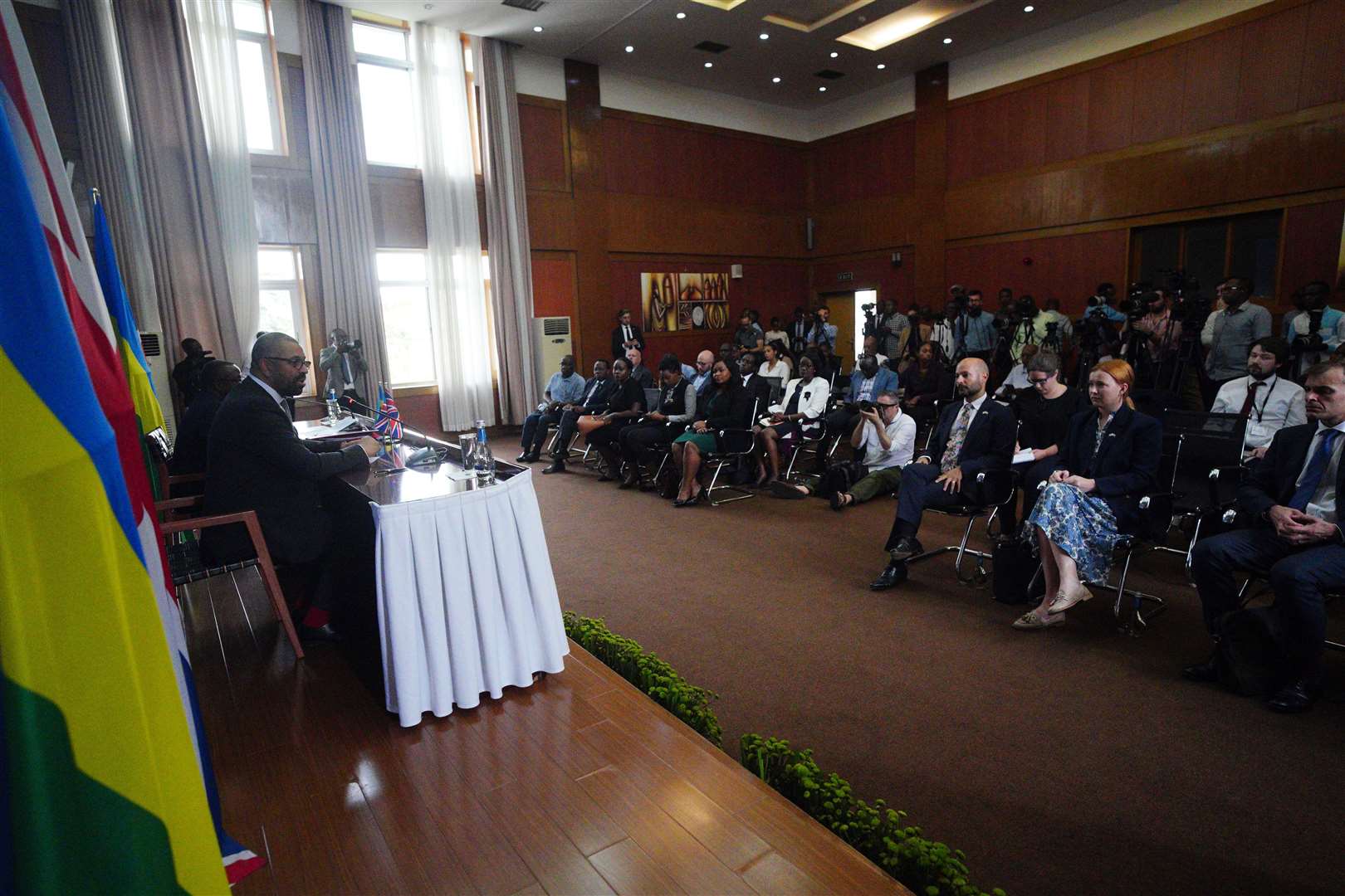 Home Secretary James Cleverly speaks during a press conference in Kigali (Ben Birchall/PA)