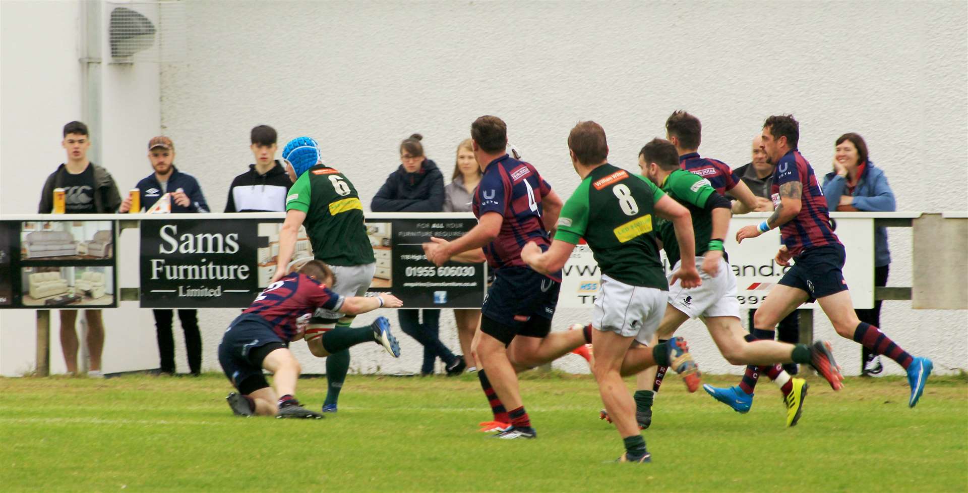 Reece Coghill races through for the bonus-point try in the Greens' 43-3 victory over Hillfoots at Millbank on the opening day of the campaign.