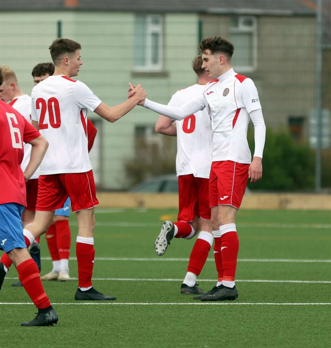 Stuart Campbell (right) is congratulated by James Mackintosh after scoring Halkirk United's equaliser. Picture: James Gunn