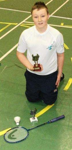 Kieran with the silverware he won at Highland Badminton Group’s competition in Inverness at the weekend.