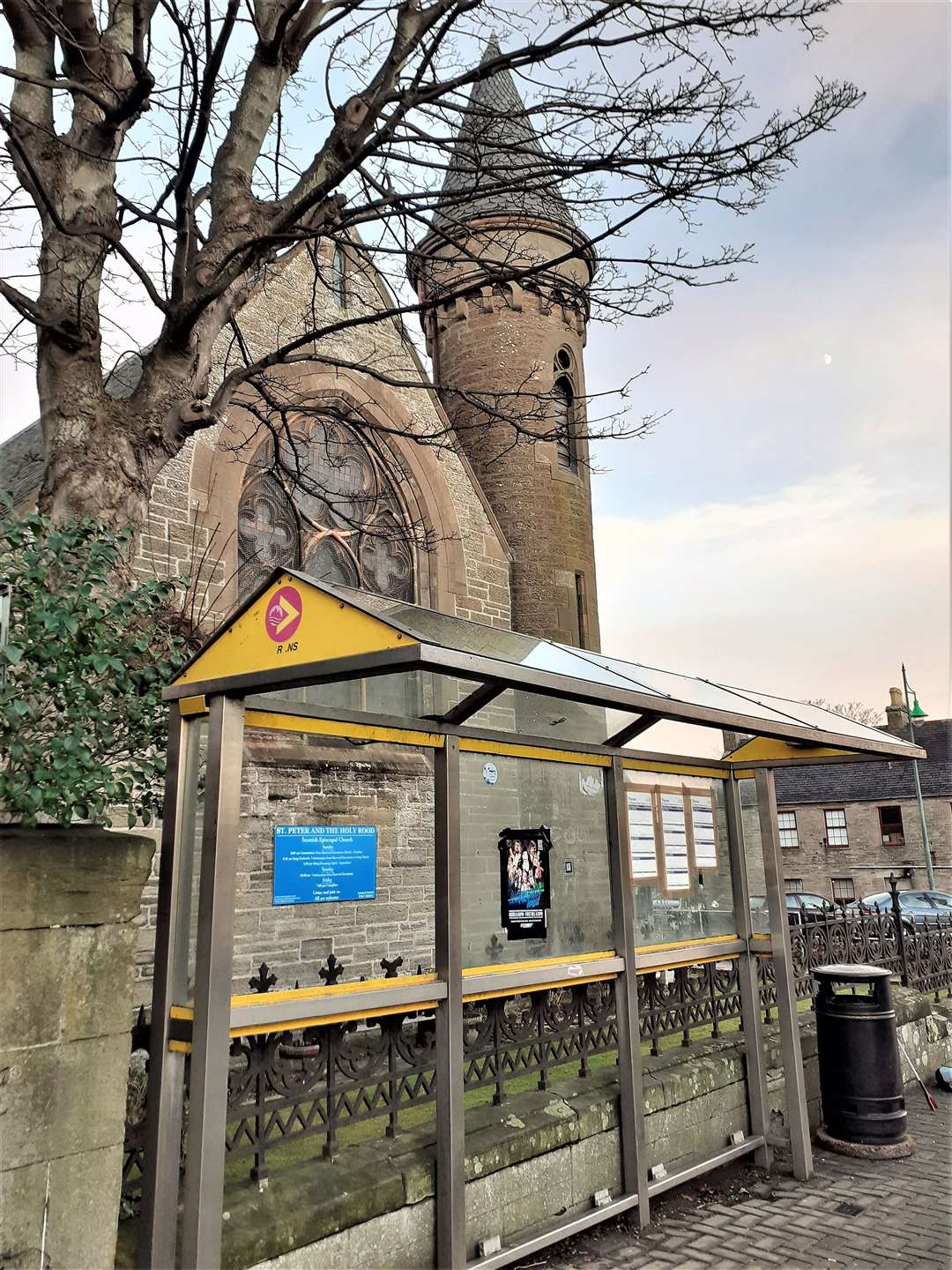 Sir George's Street bus stop is the main point for the Inverness bus. Mr Glasgow says it has 'peeling and tired paint, missing panels and litter frequently strewn into well-maintained garden of Gothic-style church'. Pictures: Alexander Glasgow