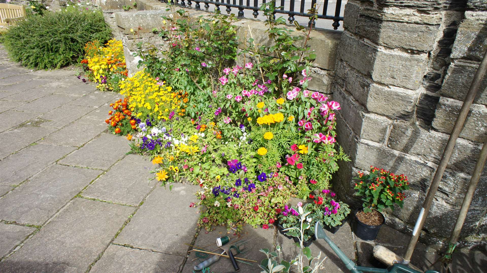 Flowers planted by the volunteers have transformed the formerly dreary exterior. Picture: DGS