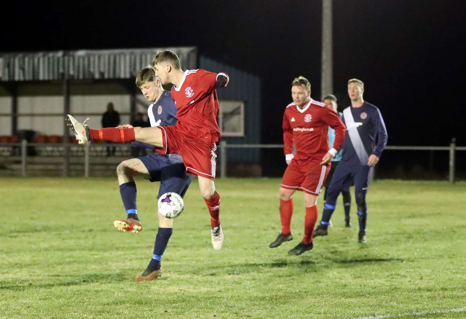 Thurso's Aaron Wilson blocks a shot from Halkirk United's Kuba Koziol during the 2-1 derby win at Morrison Park in midweek. Picture: James Gunn