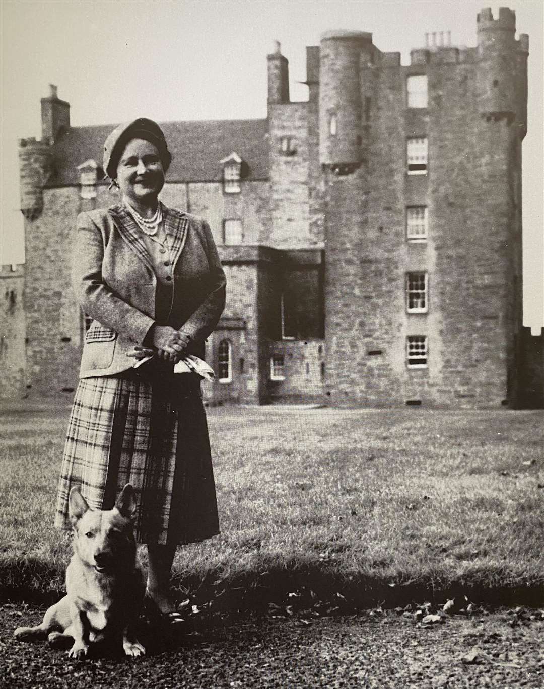 The royal family have had a long association with corgis. The Queen Mother with Honey, one of her favourite corgis, at the Castle of Mey.