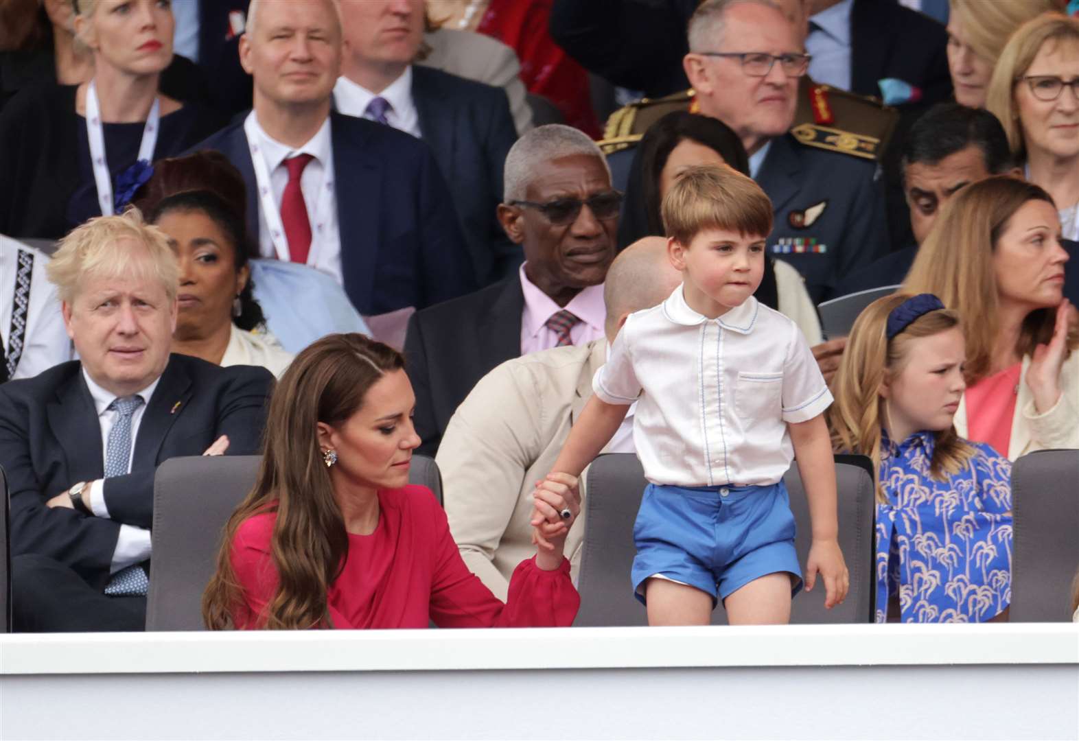 Prince Louis stands on his seat (Chris Jackson/PA)
