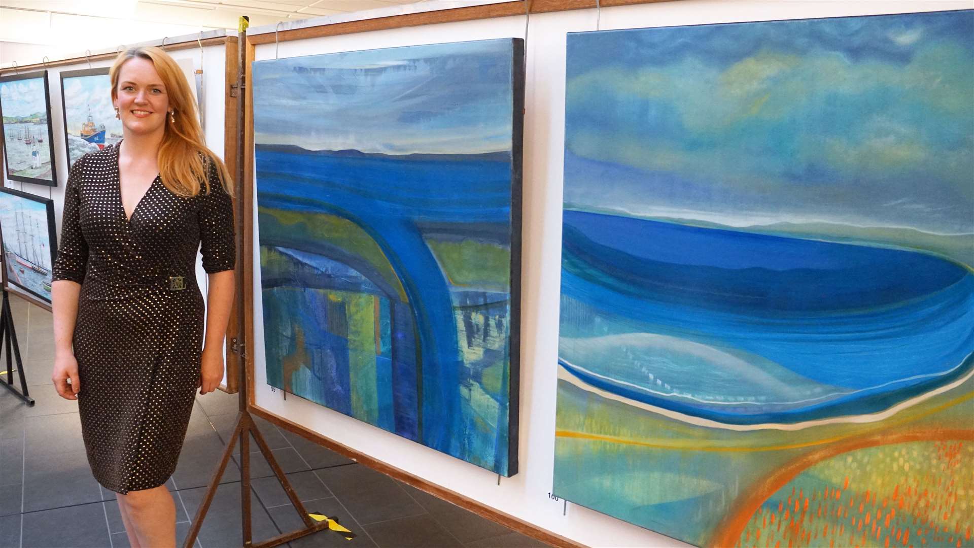 Trained artist Shelagh Swanson displays a selection of landscapes/seascapes. The painting on the right is inspired by the coast around Sinclair's Bay. Picture: DGS