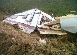 A smashed caravan on the outskirts of Auckengill which was blown from one side of the road to the other during the stormy December weather. Photo: Will Clark