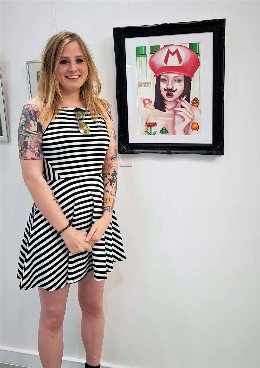Leah with one of her artworks.