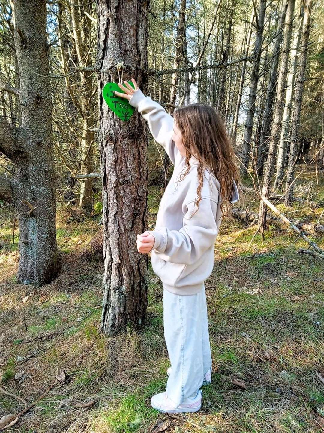 Local kids added their own green hearts with special messages. Picture supplied