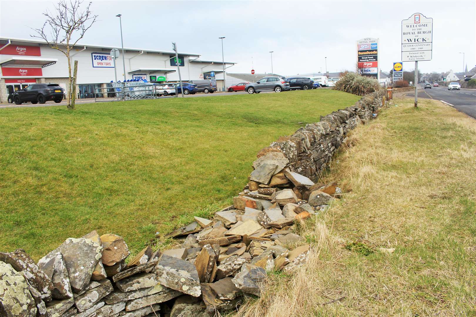 Allan Bruce pointed out that the drystone boundary wall at Wick's South Road retail park – 'the gateway to our town' – has collapsed in several places. Picture: Alan Hendry