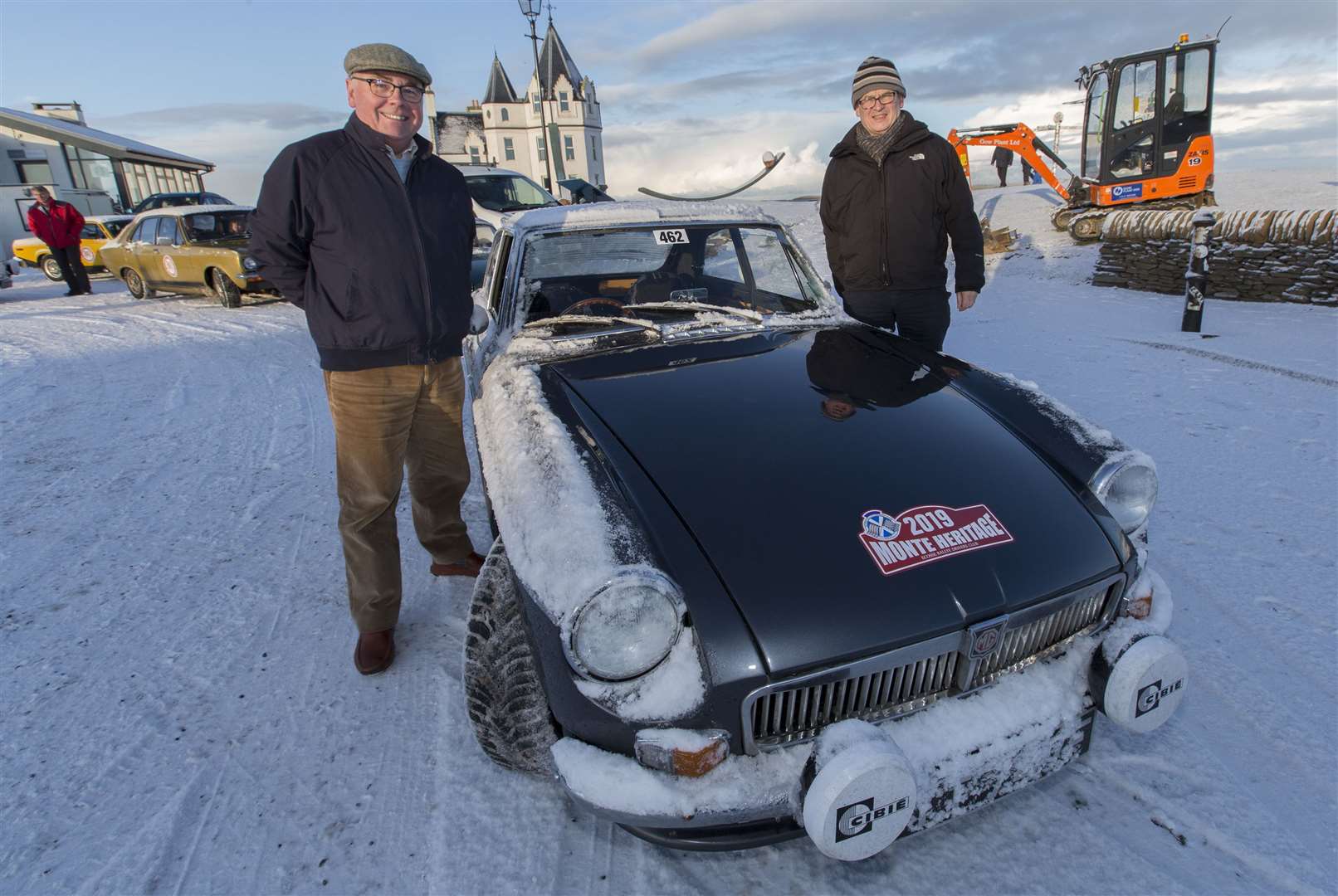 Flashback to January as Ian Close and Chris Macdonald, from Aberdeen, with their 1967 MGB GT, prepare to set off from snowy John O'Groats at the start of this year's event. Picture: Robert MacDonald / Northern Studios