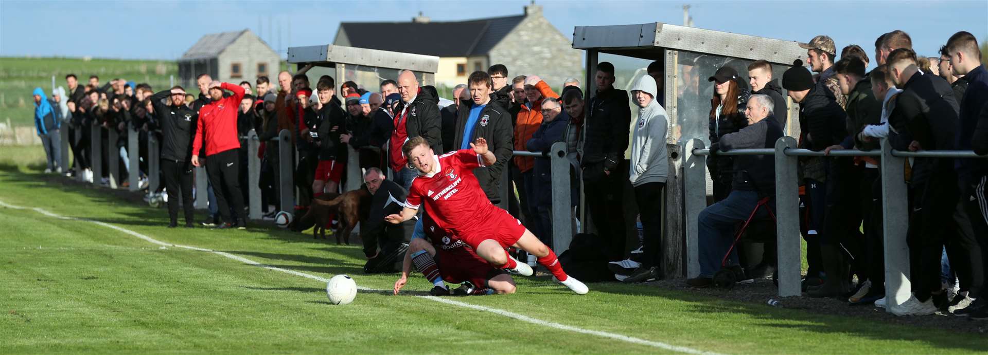 Korbyn Cameron of Wick Groats is fouled by Pentland United's Sean Campbell on the touchline during Tuesday's semi-final at Ham Park. Picture: James Gunn