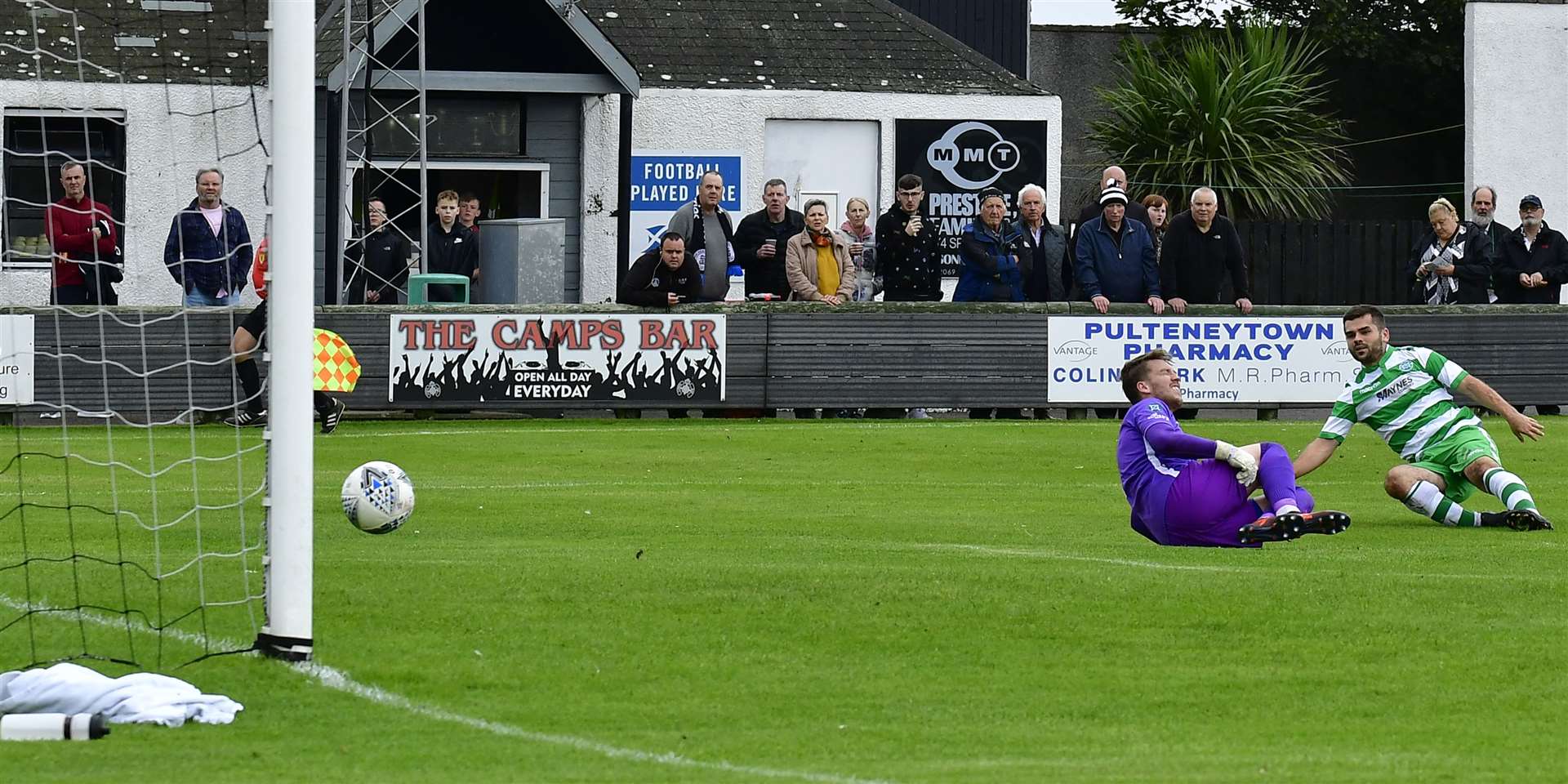 Andy MacAskill fires the ball past Sean McCarthy for Buckie's equaliser at Harmsworth Park. Picture: Mel Roger