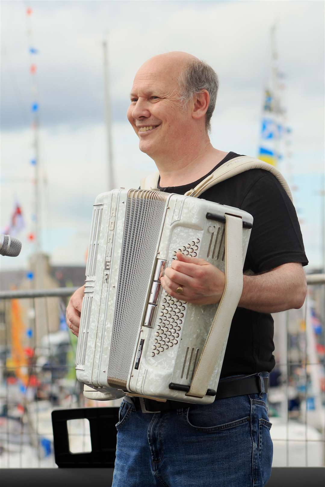Addie Harper playing the accordion at Wick RNLI Harbour Day. Picture: Alan Hendry