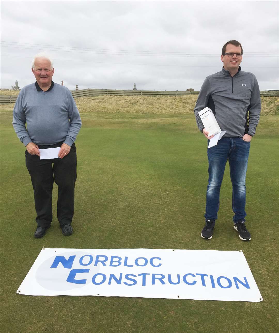 Kenny Farmer Snr (left), winner of the handicap trophy in Reay Golf Club's Ronnie Wallace Open, sponsored by Norbloc, and scratch trophy winner Brent Munro.