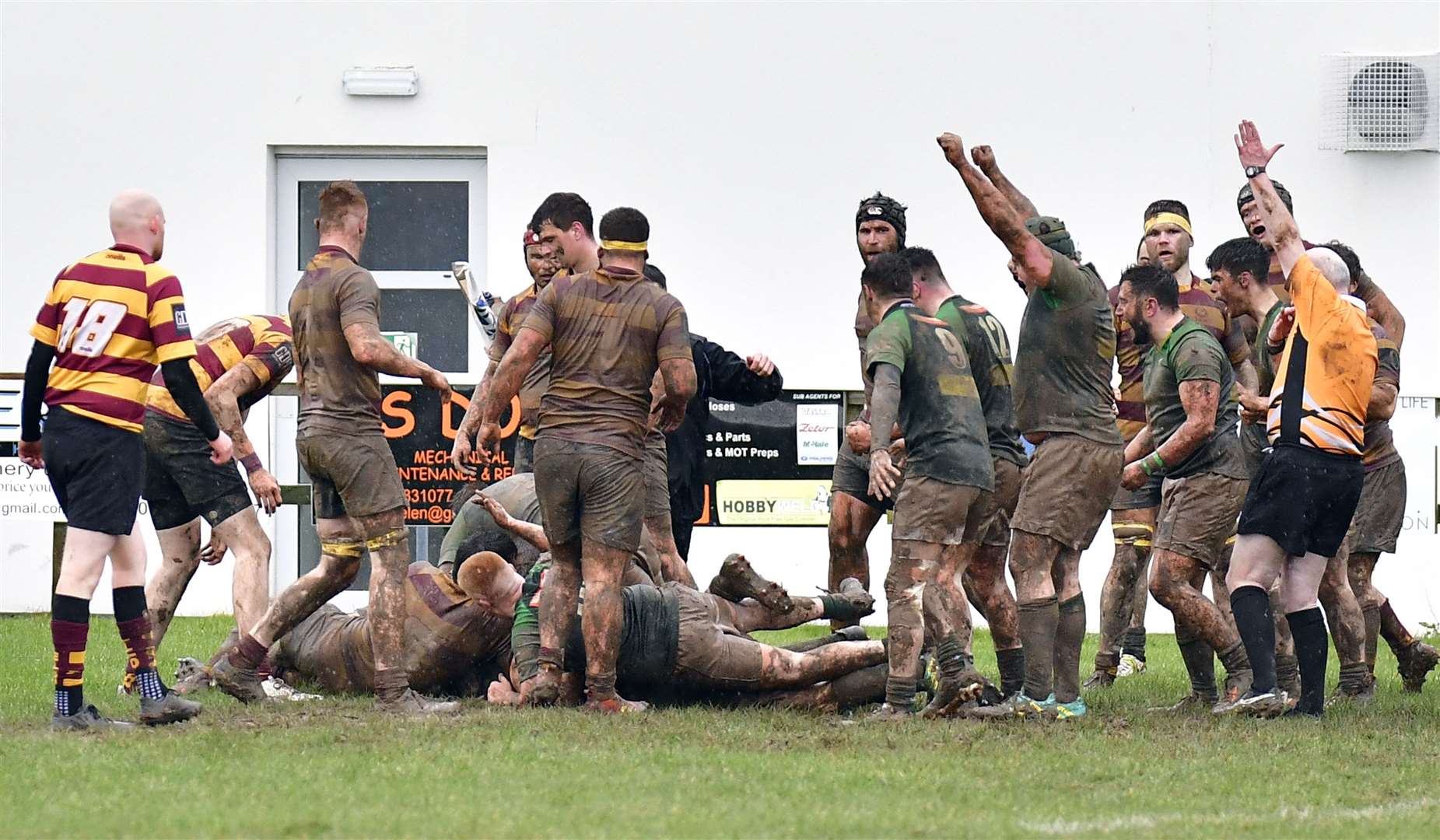 Caithness players celebrate the decisive try in their 15-14 Caley 1 League victory over Ellon. Picture: Mel Roger