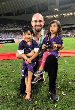 Marc with his children Logan (4) and Esmae (2) when Al Ain won the Arabian Gulf League.