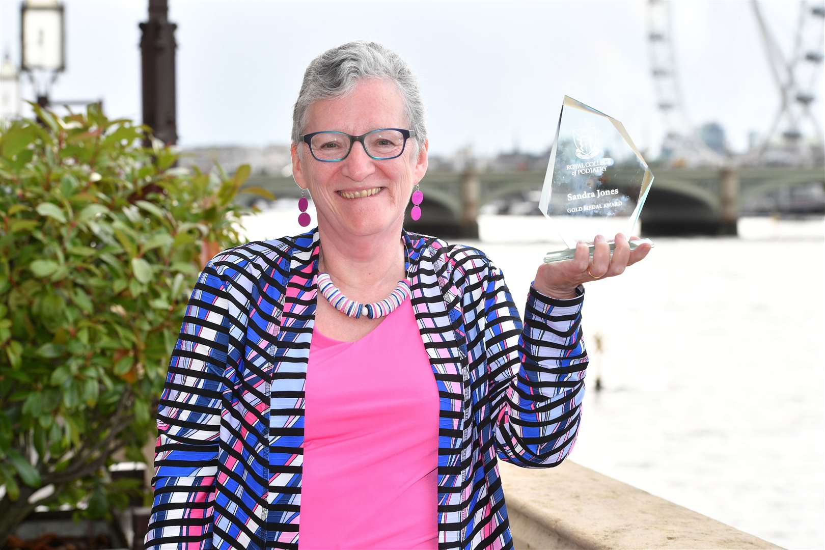 Sandra Jones with her award on the Cholmondeley Room terrace at the House of Lords.