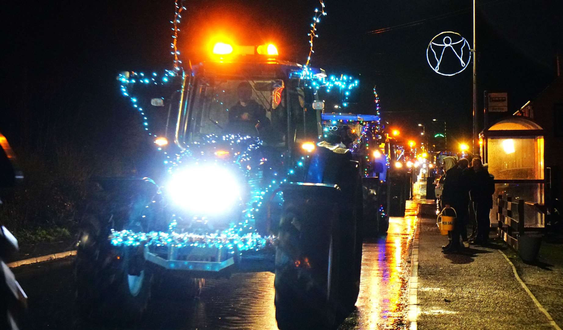 Young Farmers centenary tractor run travels through Watten on its way to Wick. Picture: DGS