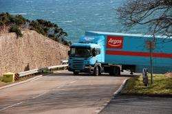 A lorry negotiates the notorious north hairpin at the Berriedales Braes.