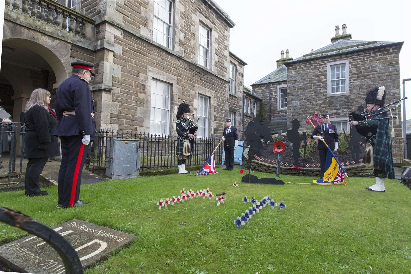 The service in the garden of remembrance beside Wick Town hall on Saturday morning was organised by the Wick, Canisbay and Latheron branch of the Royal British Legion Scotland, with Lord Thurso placing a poppy wreath. Picture: Robert MacDonald / Northern Studios