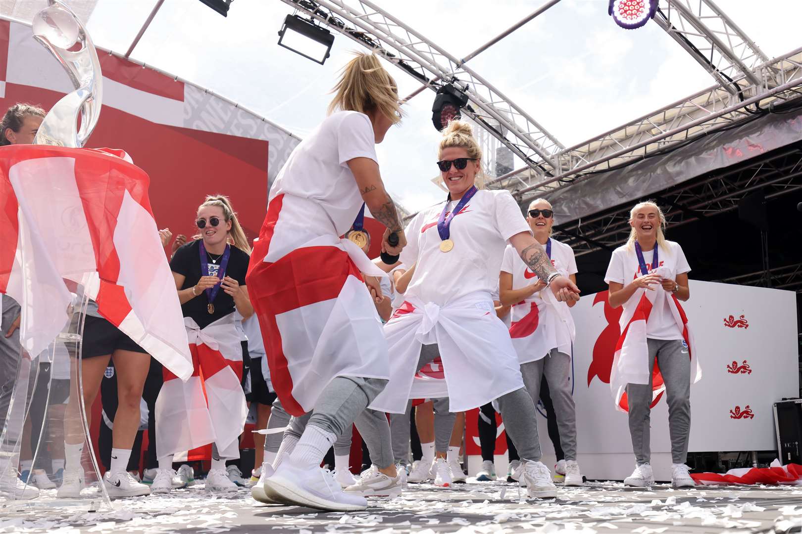 Millie Bright on stage during a fan celebration to commemorate England’s Euro 2022 triumph in Trafalgar Square, London (James Manning/PA)