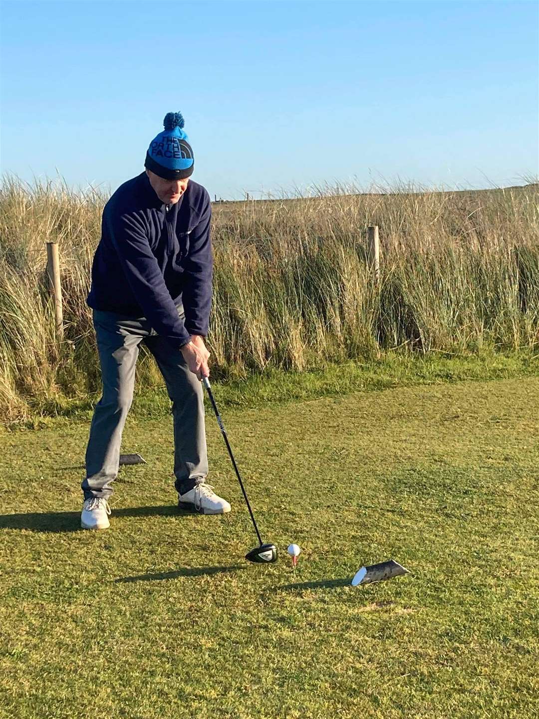 John O’Brien preparing to tee off at the sixth hole.