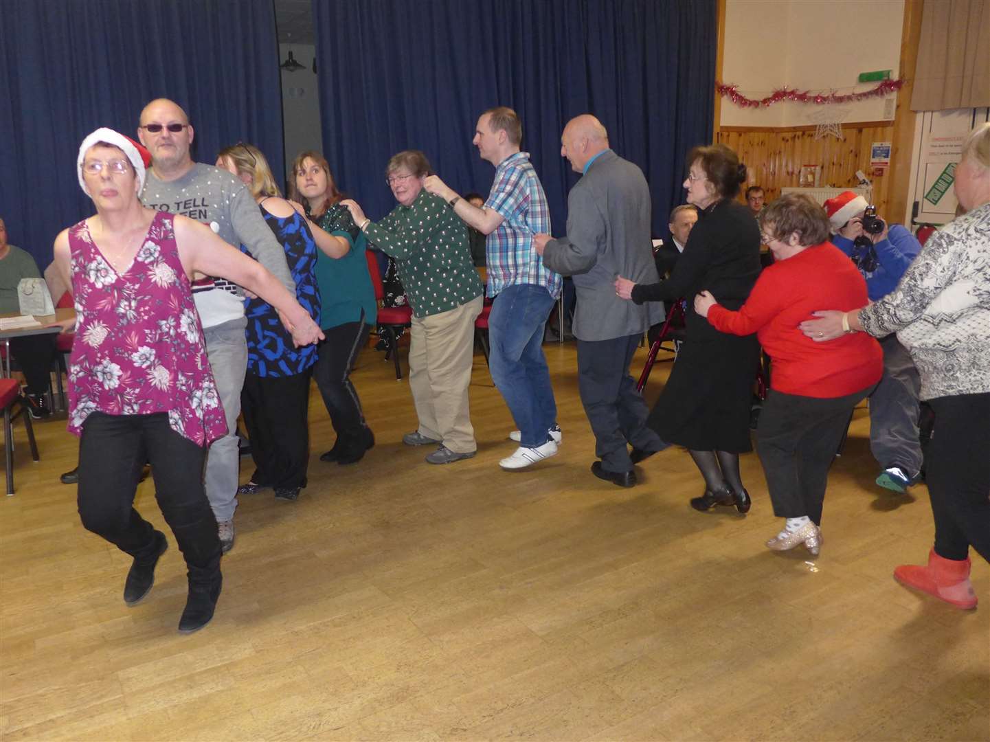 Committee member Catherine Mahon leads the conga around the clubrooms to round off a non-stop afternoon of fun and dancing which was enjoyed by all. Picture: Willie Mackay