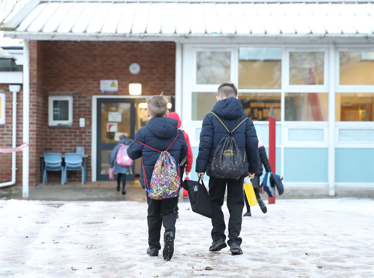 The Department for Education said children with at least one parent or carer who was a critical worker could attend onsite (Martin Rickett/PA)