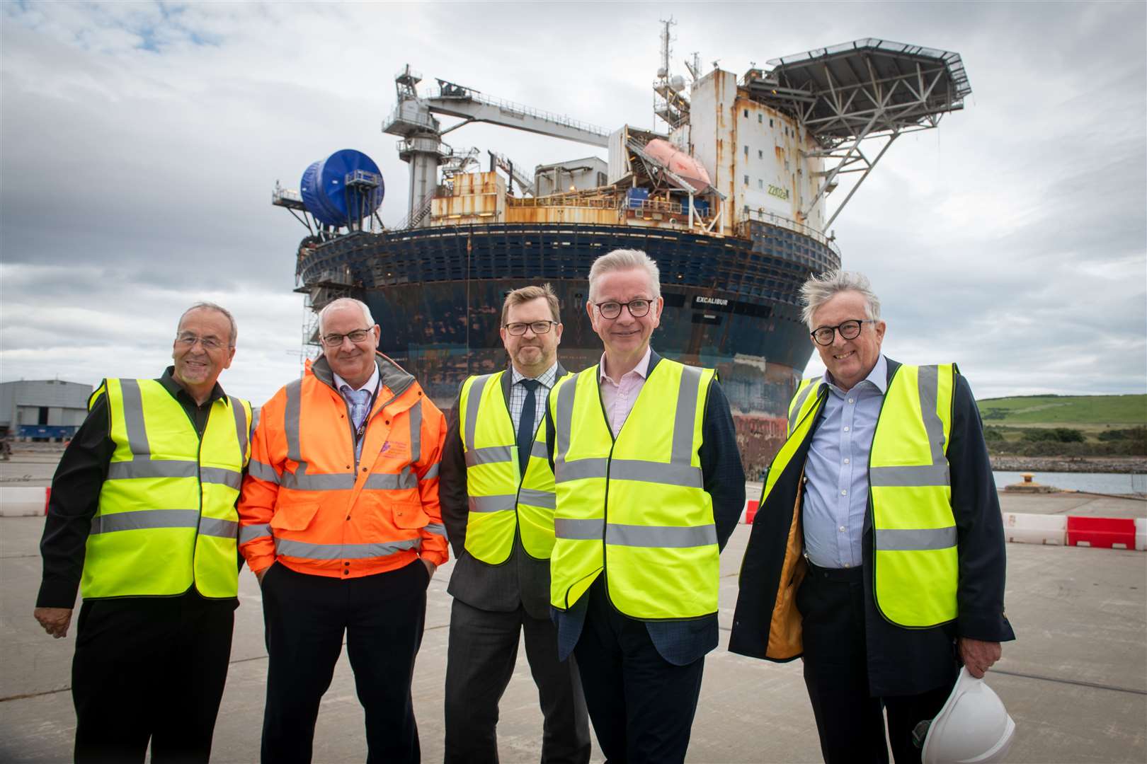 Jamie Stone (right) at Nigg last August with Roy MacGregor of Global Energy Group, Highland Council leader Raymond Bremner, Calum MacPherson of Inverness and Cromarty Firth Green Freeport and Michael Gove, the UK government levelling-up secretary. Picture: Callum Mackay
