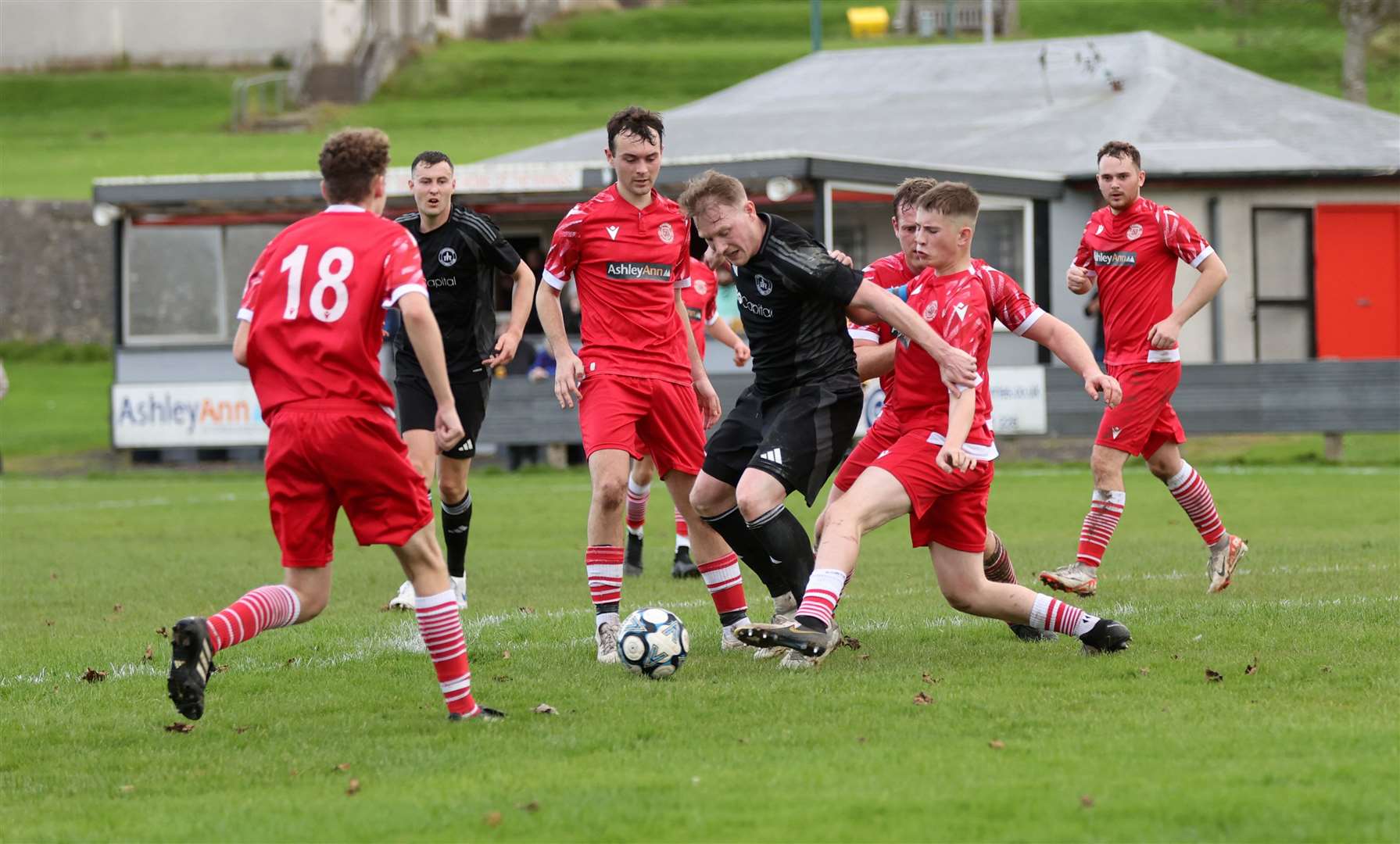 Thurso captain Liam Bain tackles Invergordon's Ally MacDonald. Picture: James Gunn