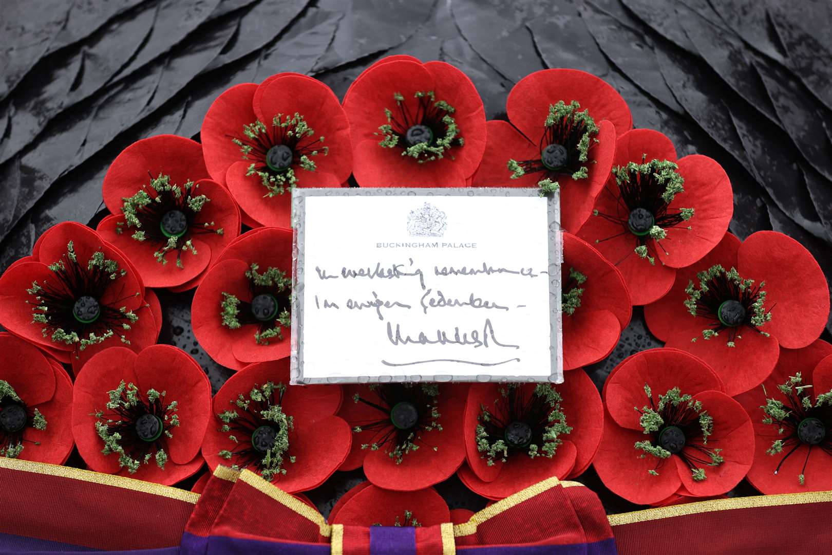 The King’s message of ‘everlasting remembrance’ can be seen on the wreath (Adrian Dennis/PA)