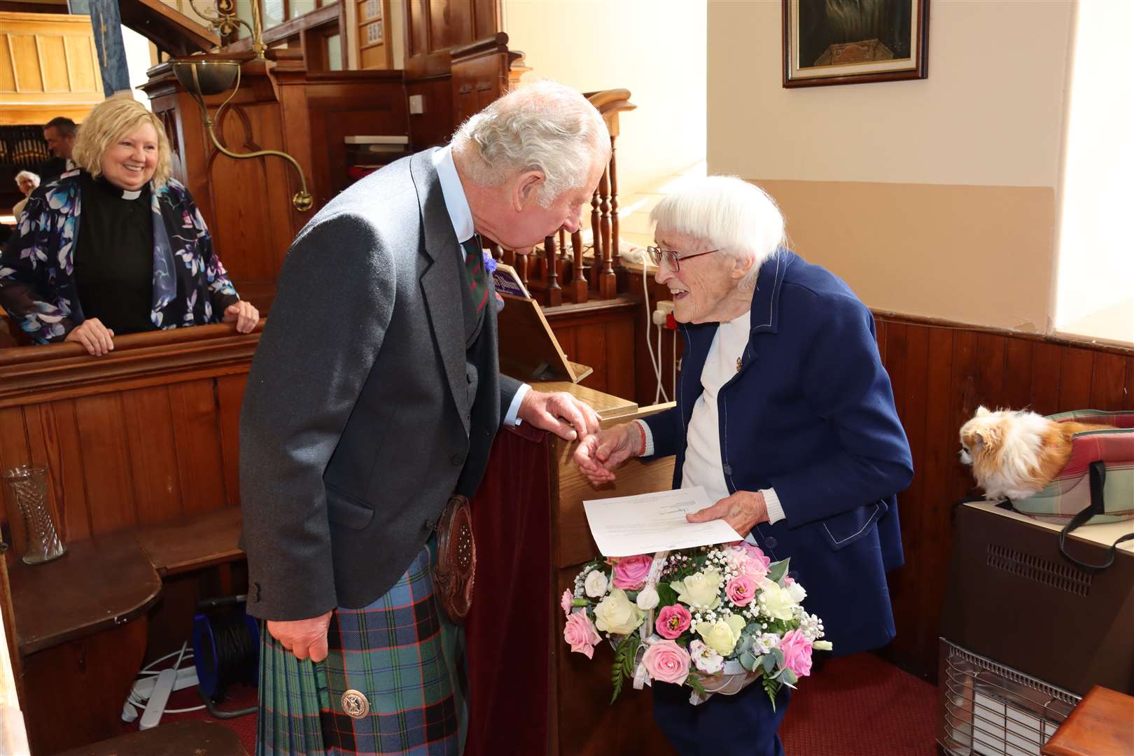 Mary Edmundson chats to Prince Charles after the presentation at Canisbay Church on Sunday. Picture: Neil Buchan