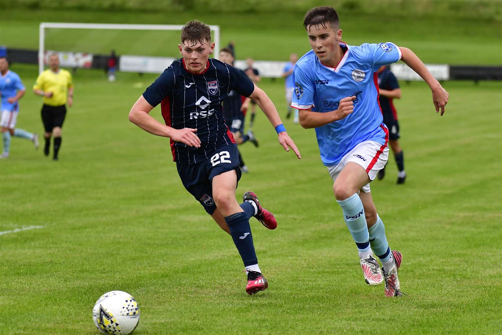 Matthew Robertson (Ross County) and Matthew Aitkenhead (Wick Academy) in a race for the ball during a pre-season friendly between the two teams in July. Picture: Mel Roger