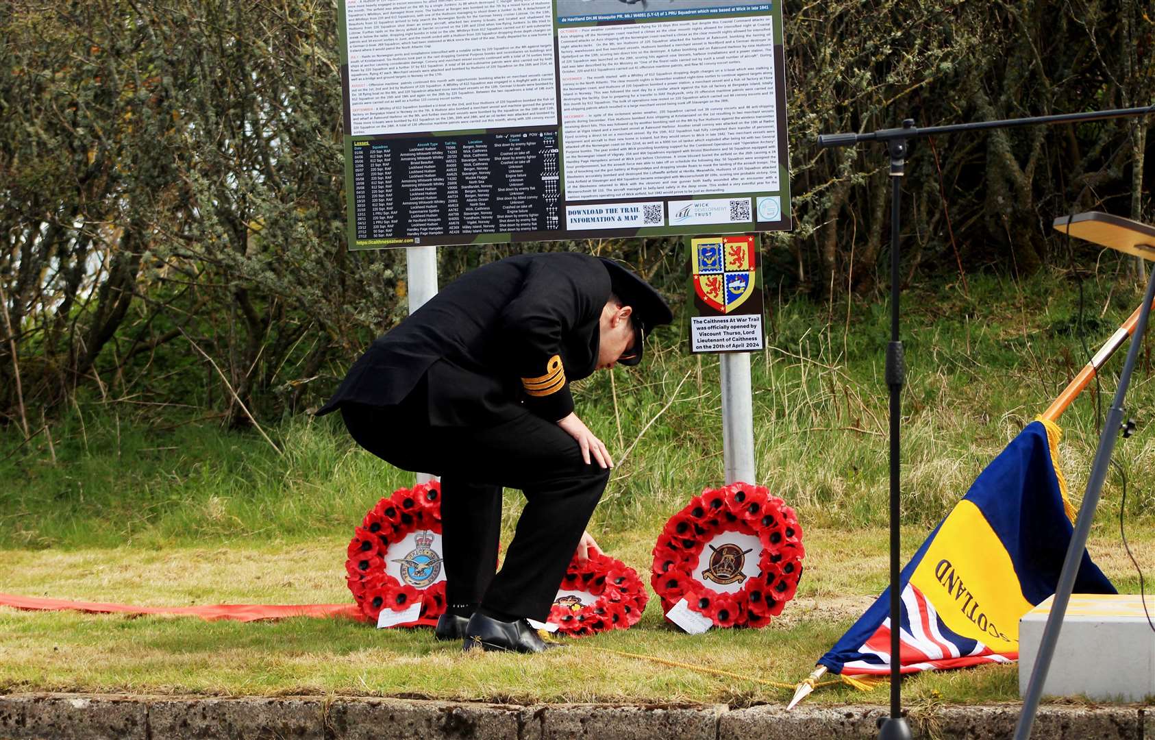 Commander Ian Walker, of Vulcan, laying a wreath as the Royal Navy representative. Picture: Alan Hendry