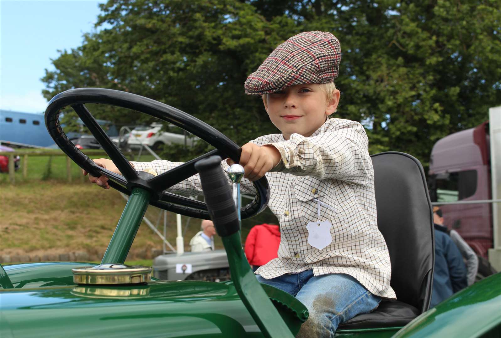 Six-year-old Camden Hollick, from Thurso, at the wheel of a 1948 Field Marshall tractor owned by Nicol Mackenzie. Picture: Alan Hendry
