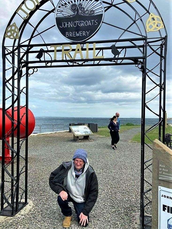 The moment Hugh goes down on a bended knee under the new John O'Groats archway to propose marriage. Carol thought she was just going to take a regular snap of him and had no idea he was about to propose.