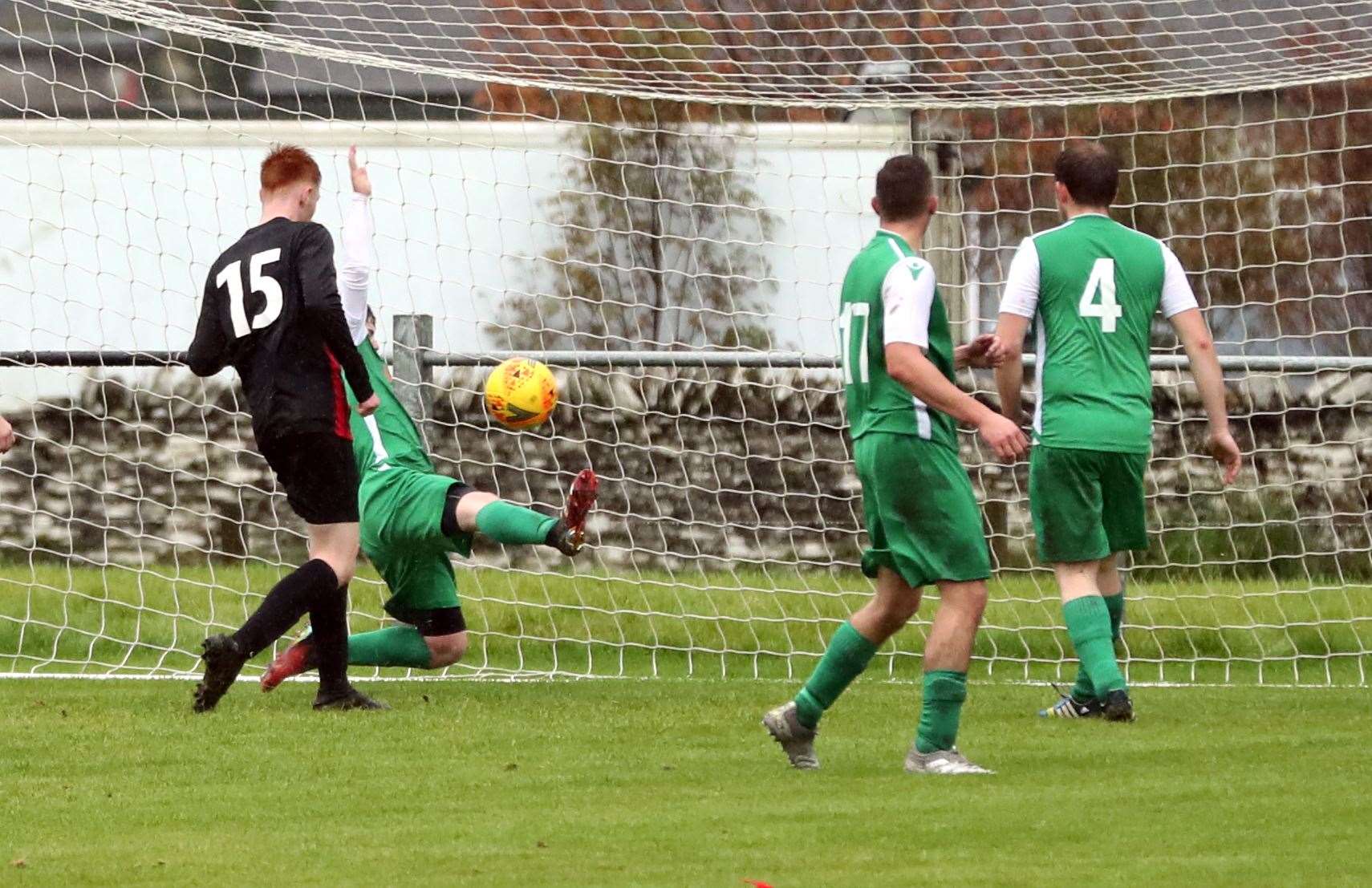 Halkirk United's Ross Mackay scores the fourth and decisive goal. Picture: James Gunn