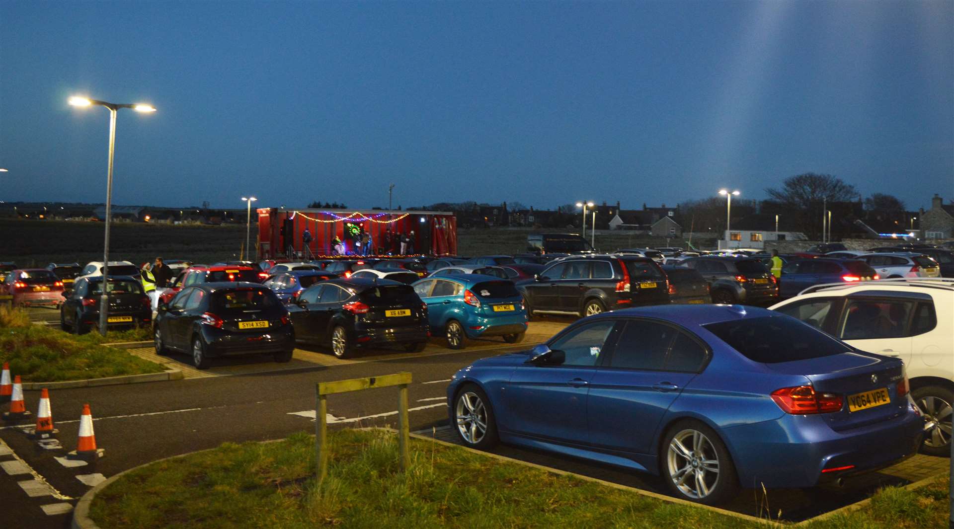 Some of the vehicles in the East Caithness Community Facility car park during Sunday's drive-in carol event. Picture: Susan Barrie