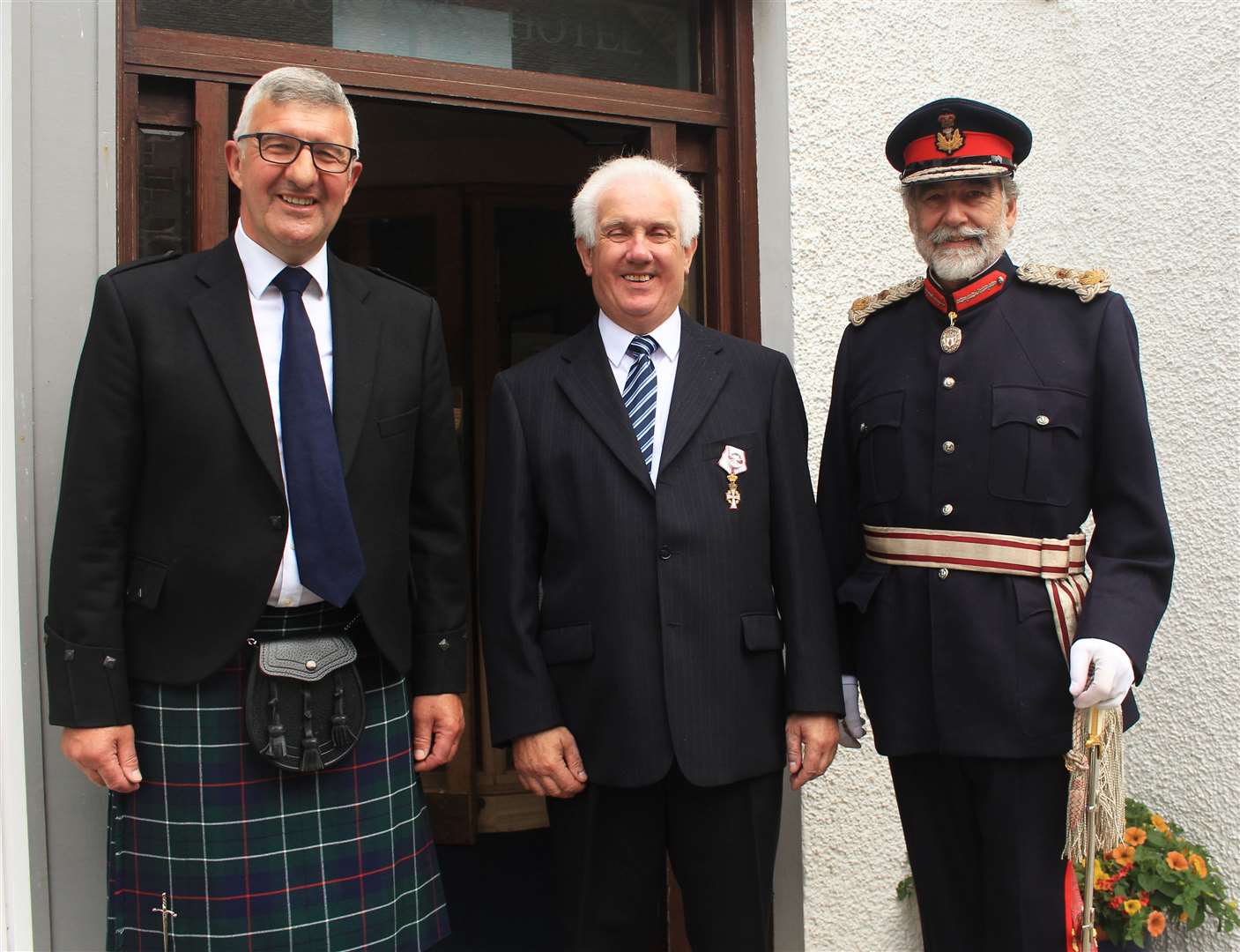 Malcolm Bremner (centre), Vice-Consul of Denmark, after being awarded the Knight’s Cross of First Class of the Order of Dannebrog, with the Vice-Lieutenant of Caithness, Willie Watt, and the Lord-Lieutenant, Lord Thurso. Picture: Alan Hendry
