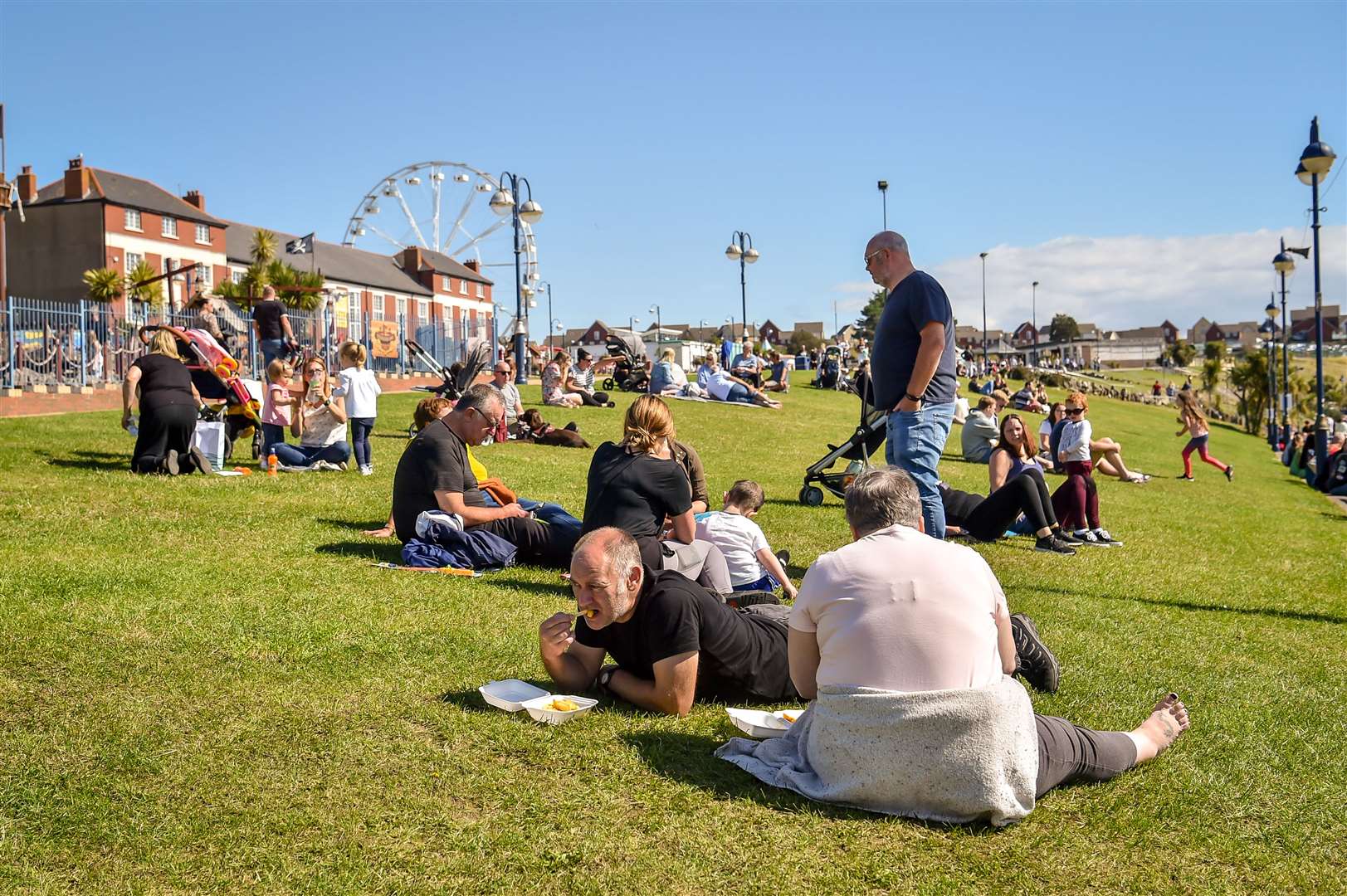 Lunch in the sun at Barry Island, Wales (Ben Birchall/PA)