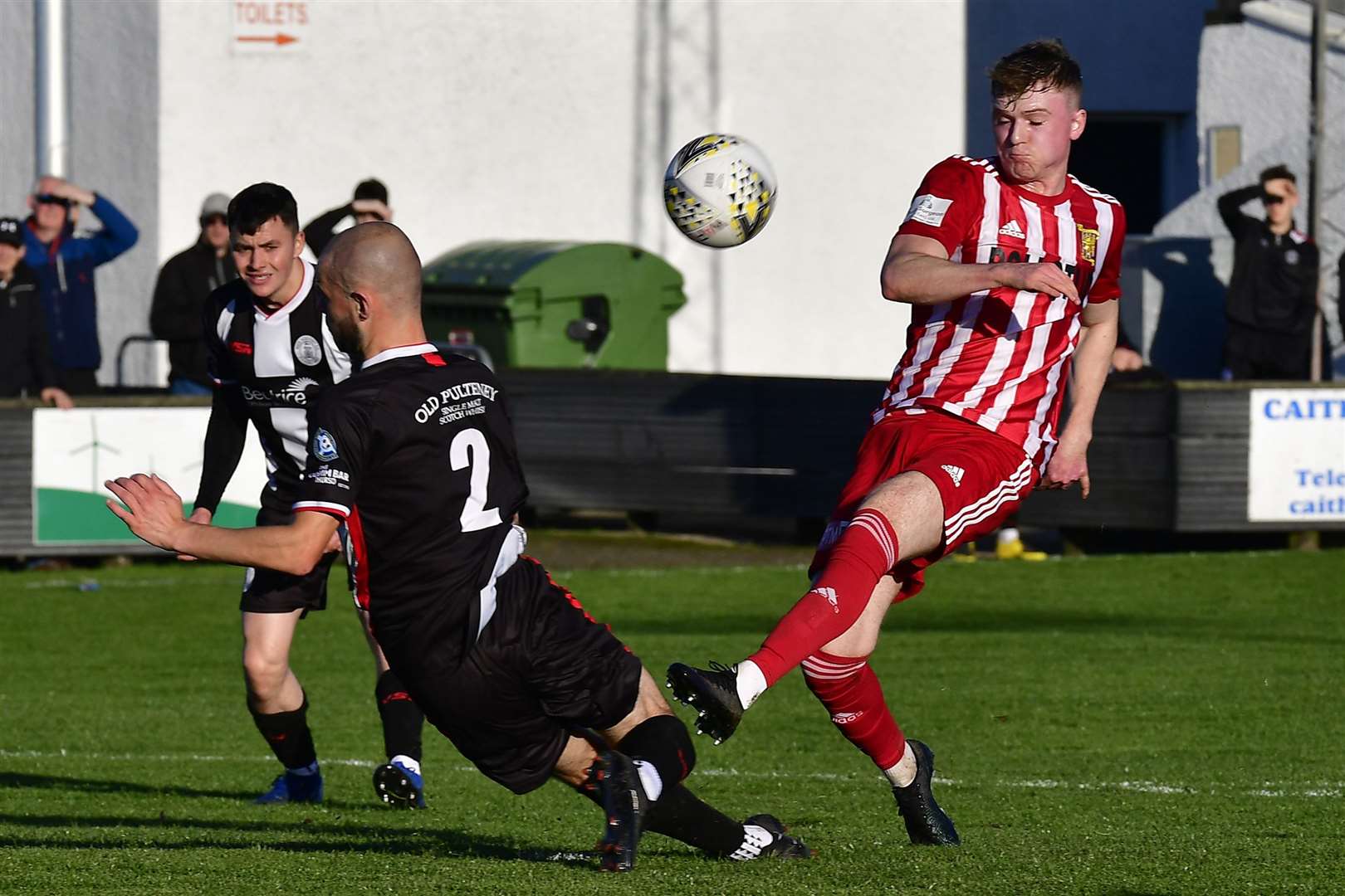Sean Munro blocks a shot from Formartine United's Aidan Combe. Picture: Mel Roger