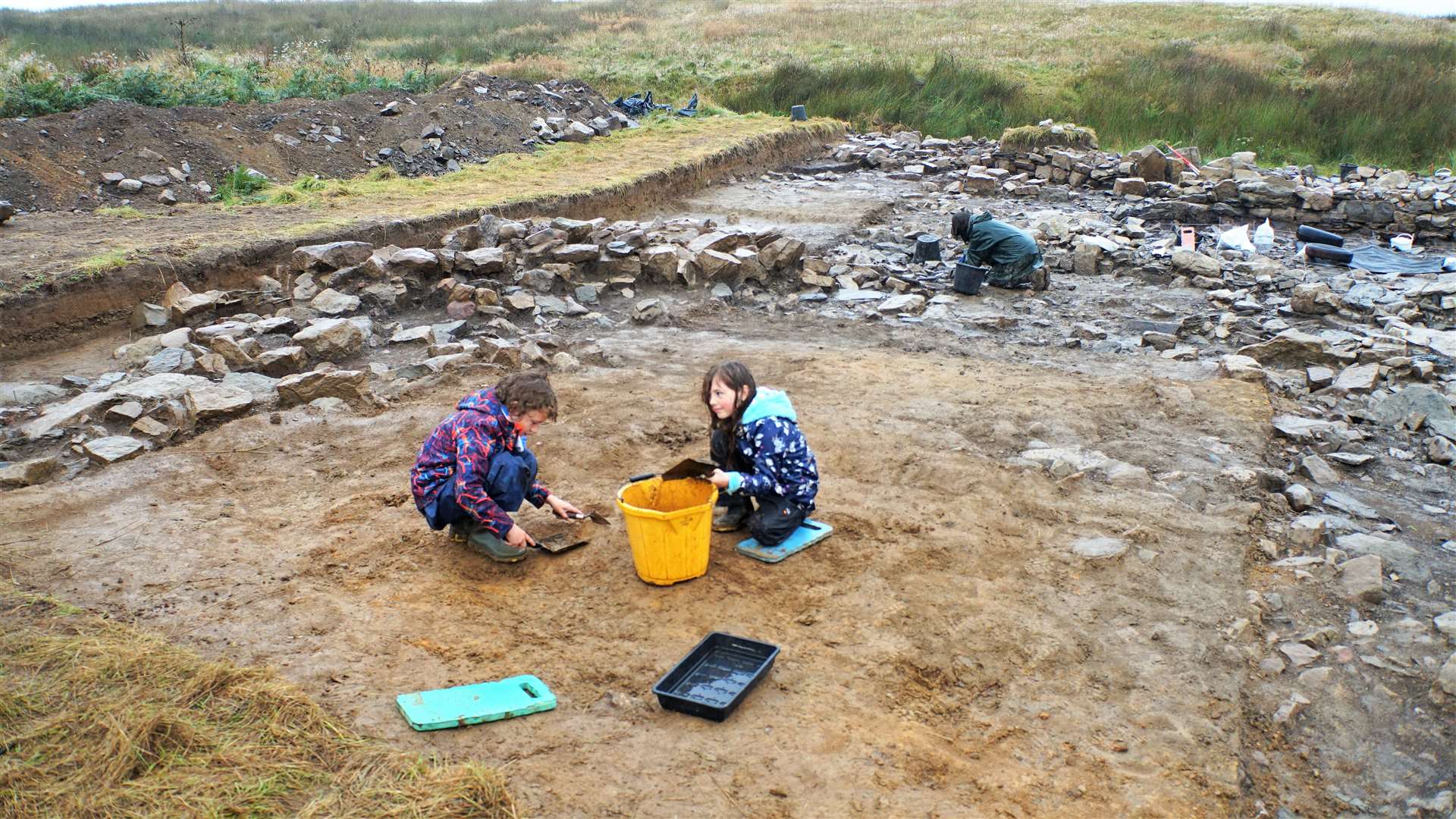 Orkney archaeologist, Martin Carruthers, had his children Luca and Amalia along to help with the dig.
