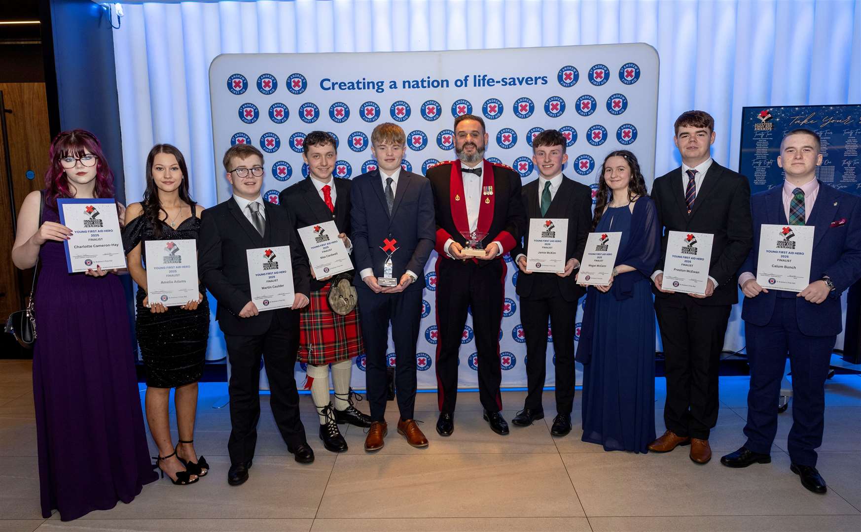 Colonel Gordon Rae with John Bremner (centre) along with fellow cadets who won a special recognition award.