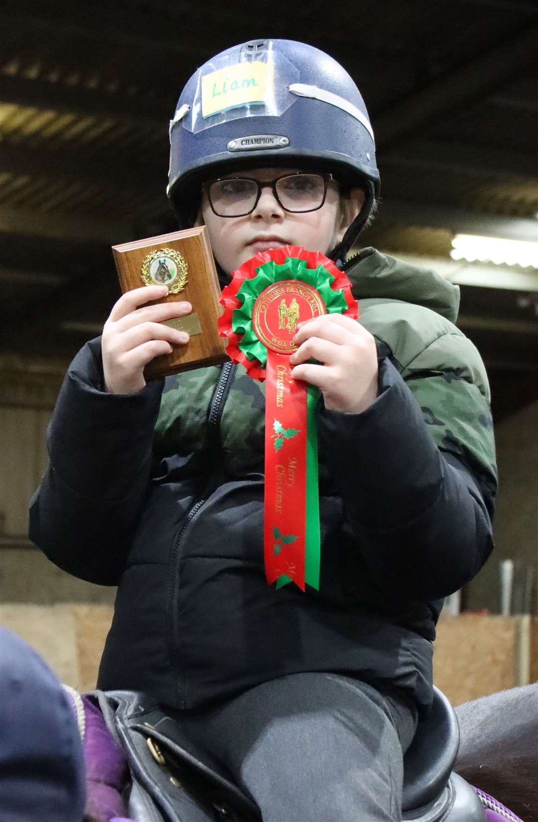 Liam Brown from Ride 1 with his shield for achievement and rosette. Picture: Neil Buchan